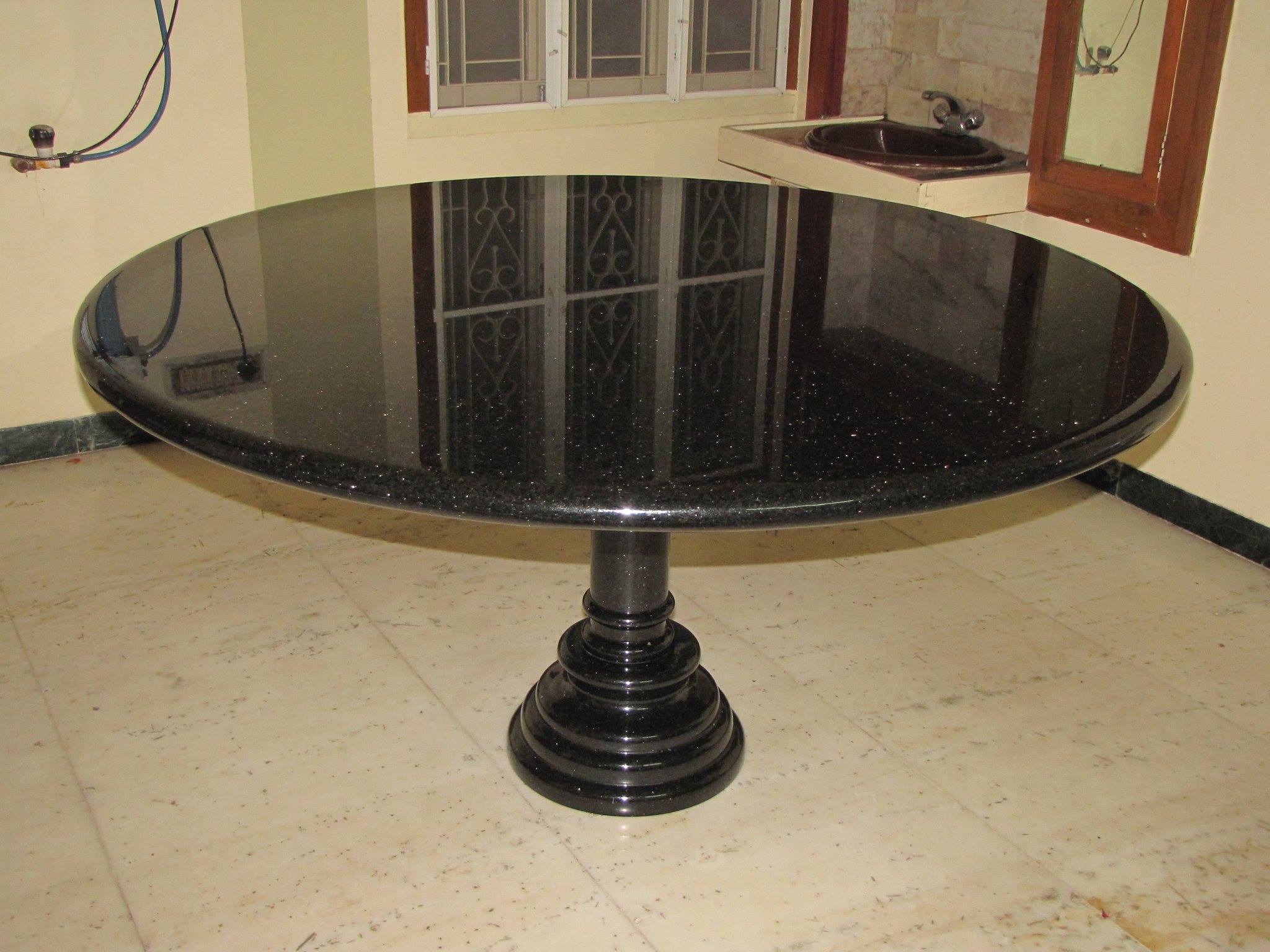 Black Granite Dining Table With Round Pillar